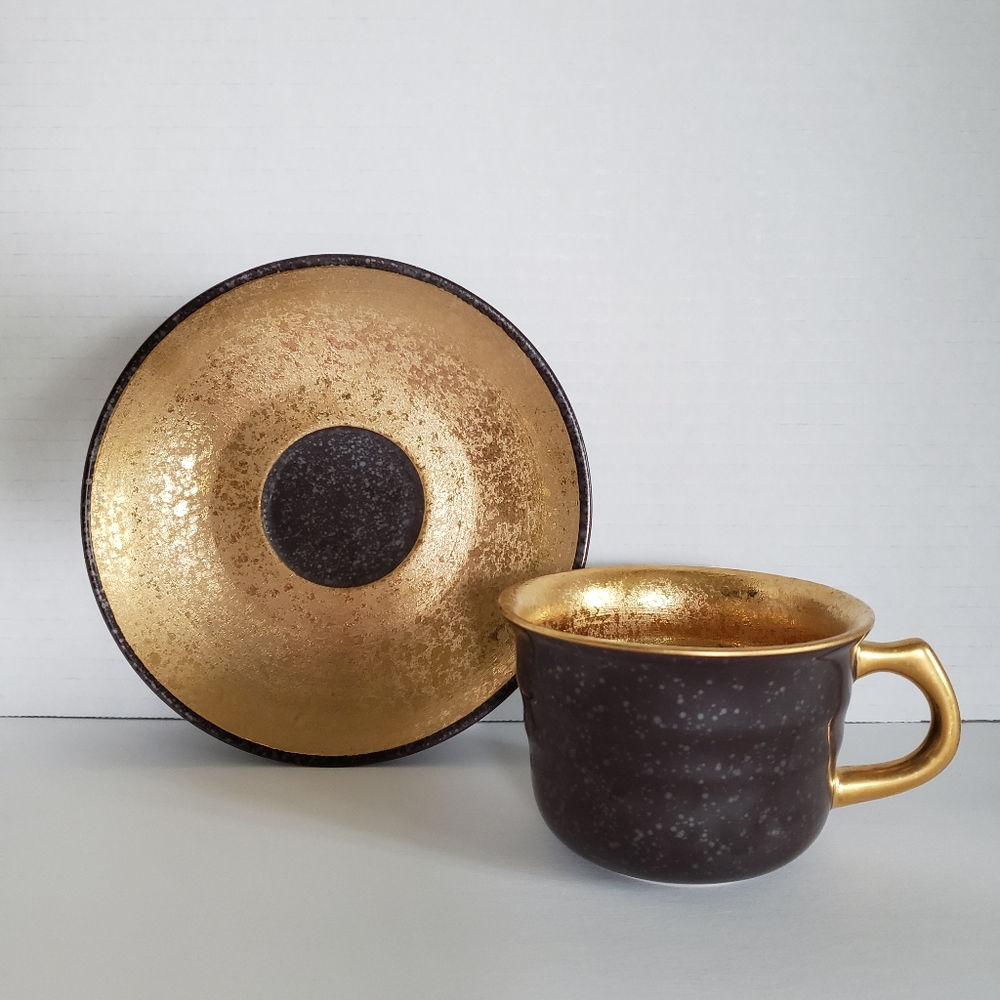 Tea cup and saucer color gold & brown